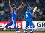 India’s Jasprit Bumrah celebrates the dismissal of Afghanistan’s Rahmanullah Gurbaz on Sunday. (Sanchit Khanna/HT)