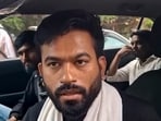 Cockroach Janta Party (CJP) founder Abhijeet Dipke talks to the media as he arrives to visit affected tribal families at a village, in Balaghat district, Madhya Pradesh, Saturday, Sept. 12, 2026. 