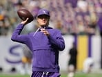 Minnesota Vikings quarterback J.J. McCarthy warms up before an NFL football game against the Green Bay Packers.(AP Photo/Bailey Hillesheim)