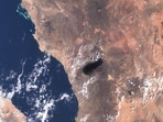 This handout satellite image from Copernicus Sentinel Data taken on September 10, 2016, shows black smoke billowing over the desert southeast of Medina along the general route of Saudi Arabia's East-West pipeline (Petroline).(AFP)