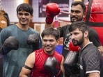 The Asian Games bound Indian men’s boxing team at the NIS Patiala. (PTI)