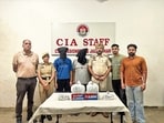 The Jalandhar commissionerate police arrested two youths after recovering 5 kg heroin and  <span class='webrupee'>₹</span>1.5 lakh of suspected drug money from their possession. (HT Photo)