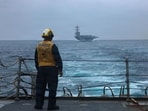 A US Sailor standing on the flight deck of Arleigh Burke-class guided-missile destroyer USS Mason on September 4, 2026. (AFP)