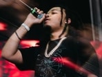 Chicago drill rapper BloodHound Q50 was fatally shot by six gunmen at a gas station in Fuller Park, with over 50 rounds fired. 