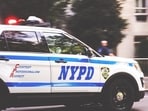 A police officer was dragged to the ground by a BMW that sped away during an attempted traffic stop in New York City's Times Square.(Unsplash)
