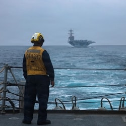 A US Sailor standing on the flight deck of Arleigh Burke-class guided-missile destroyer USS Mason on September 4, 2026. 