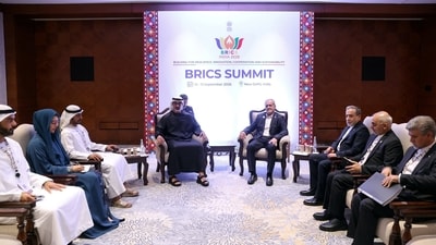 Iranian President Masoud Pezeshkian meets with Crown Prince of Abu Dhabi Sheikh Khaled bin Mohamed bin Zayed Al Nahyan on the sidelines of the BRICS summit in New Delhi. (REUTERS)