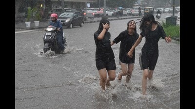 Chandigarh, India September 13, 2026: Girls enjoying during Rain in Chandigarh on Sunday, September 13, 2026.Photo by Keshav Singh/Hindustan Times. Chandigarh, India September 13, 2026: Girls enjoying during Rain in Chandigarh on Sunday, September 13, 2026.Photo by Keshav Singh/Hindustan Times.
