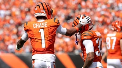 Ja'marr Chase #1 of the Cincinnati Bengals celebrate after scoring a touchdown with Chase Brown #30 against the Tampa Bay Buccaneer during the second quarter of the game at Paycor Stadium in Cincinnati, Ohio. (Getty Images via AFP)