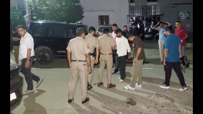 Police officials outside the club where the firing took place in Panchkula. (Sant Arora/HT) Police officials outside the club where the firing took place in Panchkula. (Sant Arora/HT)
