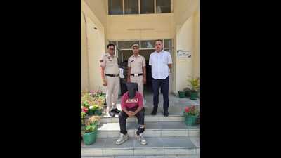 The arrested accused in police custody on Sunday. (HT Photo)