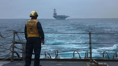 A US Sailor standing on the flight deck of Arleigh Burke-class guided-missile destroyer USS Mason on September 4, 2026. (AFP) A US Sailor standing on the flight deck of Arleigh Burke-class guided-missile destroyer USS Mason on September 4, 2026. (AFP)