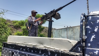 A member of the Saudi-backed Yemeni government forces, including National Army and Taiz Axis forces, mans a turret mounted on the back of a pickup truck at a checkpoint along the Kadha frontline west of Taiz in western Yemen on September 13, 2026. A member of the Saudi-backed Yemeni government forces, including National Army and Taiz Axis forces, mans a turret mounted on the back of a pickup truck at a checkpoint along the Kadha frontline west of Taiz in western Yemen on September 13, 2026.