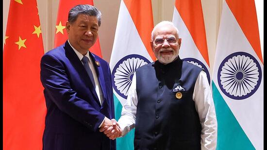 All eyes were on China’s President Xi Jinping as he visited India after seven years. In both his bilateral meeting with Prime Minister Narendra Modi and his address, Xi belied the perception in some quarters that China merely sees the grouping as a platform for challenging American hegemony. (AFP)
