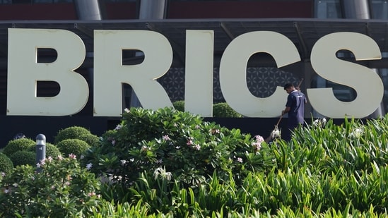 A man sweeps at Bharat Mandapam, the venue of BRICS Summit in New Delhi, India, September 13, 2026. 