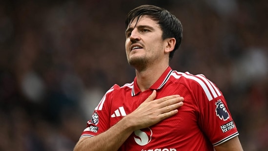CORRECTION / Manchester United's English defender #05 Harry Maguire celebrates after his team's second goal when his shot was deflected by Ipswich Town�s English back Jacob Greaves (not pictured) and ruled an own goal, during the English Premier League football match between Manchester United and Ipswich Town at Old Trafford in Manchester, north west England, on August 30, 2026. (Photo by Paul ELLIS / AFP) / RESTRICTED TO EDITORIAL USE. No use with unauthorized audio, video, data, fixture lists, club/league logos or 'live' services. Online in-match use limited to 120 images. An additional 40 images may be used in extra time. No video emulation. Social media in-match use limited to 120 images. An additional 40 images may be used in extra time. No use in betting publications, games or single club/league/player publications. / �The erroneous mention[s] appearing in the metadata of this photo by Paul ELLIS has been modified in AFP systems in the following manner: [celebrates the team's second goal after his shot was reviewed as an own goal] instead of [celebrates after scoring]. Please immediately remove the erroneous mention[s] from all your online services and delete it (them) from your servers. If you have been authorized by AFP to distribute it (them) to third parties, please ensure that the same actions are carried out by them. Failure to promptly comply with these instructions will entail liability on your part for any continued or post notification usage. Therefore we thank you very much for all your attention and prompt action. We are sorry for the inconvenience this notification may cause and remain at your disposal for any further information you may require.�