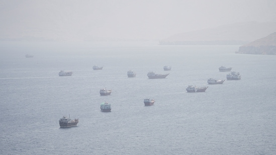 Several explosions were reported overnight around Qeshm, the largest island in the Hormuz Strait.