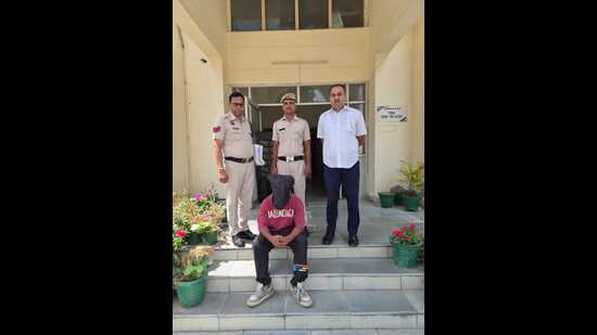The arrested accused in police custody on Sunday. (HT Photo)