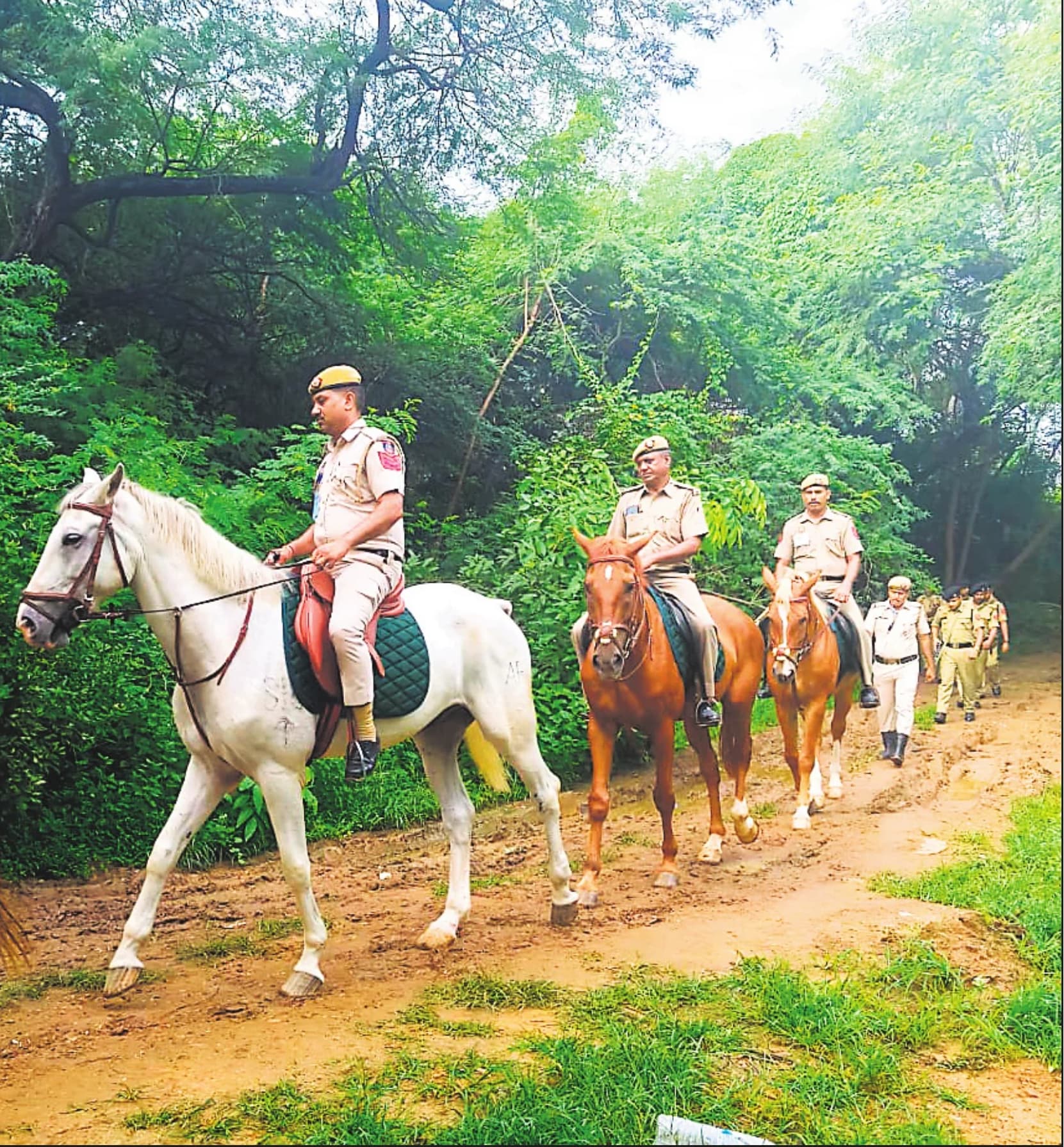 Delhi Police officers mounted on horses