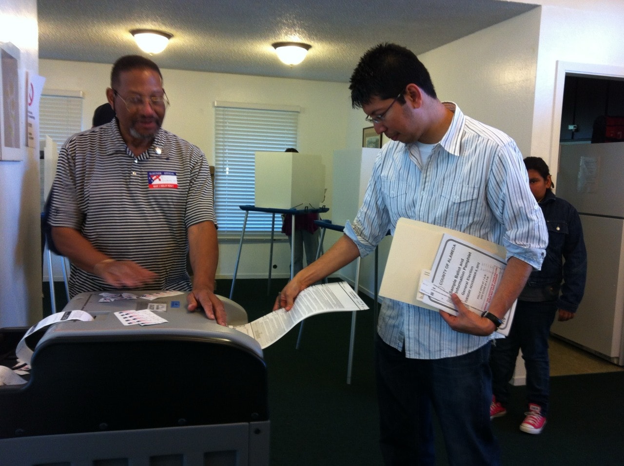 Min Zin, a naturalized American citizen, casts a ballot during the 2012 U.S. general election. Min Zin, a naturalized American citizen, casts a ballot during the 2012 U.S. general election.