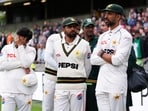 Pakistan's Babar Azam, center, with teammates following his side's defeat to England on day four of the third cricket Test at Edgbaston, Pakistan's Babar Azam, center, with teammates following his side's defeat to England on day four of the third cricket Test at Edgbaston,