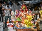 New Delhi, India - Sept. 13, 2026: People buy Ganesha idols ahead of Ganesh Chaturthi as artists give final touches to the idols at Jhandewalan in New Delhi, India, on Sunday, September 13, 2026.  (Photo by Sanchit Khanna/ Hindustan Times)