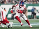 New York Giants running back Najee Harris (22) runs the ball during the first half of a preseason NFL football game against the New York Jets in East Rutherford, N.J.