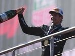 Mercedes driver Andrea Kimi Antonelli celebrates after winning the Spanish Formula One Grand Prix race in Madrid. (AP Photo/Manu Fernandez)