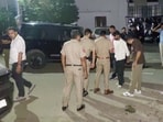 Police officials outside the club where the firing took place in Panchkula. (Sant Arora/HT)