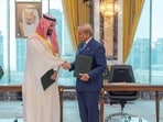 Saudi Crown Prince Mohammed bin Salman shakes hands with Pakistan's Prime Minister Shehbaz Sharif after signing a joint defence agreement in Mecca, Saudi Arabia, August 7, 2026.