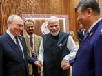IFS Sidharth Babu seen beside Prime Minister Narendra Modi as he shakes hands with Russia's President Vladimir Putin and China's President Xi Jinping during the 18th BRICS Summit in New Delhi.