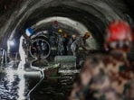 The Nepali Army conducts a search-and-rescue operation inside the Chilime Hydropower Station tunnel days after deadly flash floods and mudslides in Nepal's Rasuwa district.