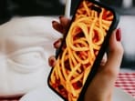 oday, phones are as common in a table-setting as napkins and silverware.