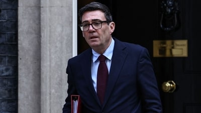 Andy Burnham has cited his family's experience while vowing to reform the social care system. (AFP)