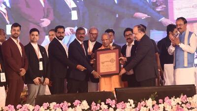 Chief minister Yogi Adityanath, Allahabad high court Chief Justice Arun Bhansali and others at an HCBA event in Prayagraj on Monday. (HT Photo)