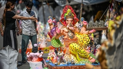 New Delhi, India - Sept. 13, 2026: People buy Ganesha idols ahead of Ganesh Chaturthi as artists give final touches to the idols at Jhandewalan in New Delhi, India, on Sunday, September 13, 2026.  (Photo by Sanchit Khanna/ Hindustan Times) (Hindustan Times)