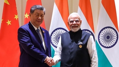 Prime Minister Narendra Modi and China's President Xi Jinping shake hands during a bilateral meeting on the sidelines of the 18th BRICS Summit at the Bharat Mandapam in New Delhi. (AFP) Prime Minister Narendra Modi and China's President Xi Jinping shake hands during a bilateral meeting on the sidelines of the 18th BRICS Summit at the Bharat Mandapam in New Delhi. (AFP)