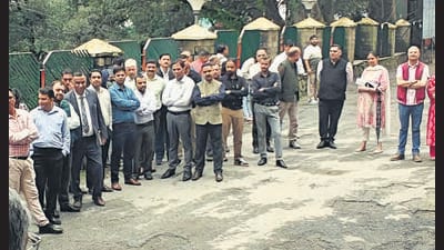 Members of Himachal Pradesh University Teachers’ Welfare Association outside the V-C’s office during a protest. Members of Himachal Pradesh University Teachers’ Welfare Association outside the V-C’s office during a protest.