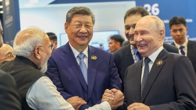 Prime Minister Narendra Modi, Russian President Vladimir Putin and Chinese President Xi Jinping share a moment at Bharat Mandapam, the venue of BRICS Summit in New Delhi, India, September 12, 2026. (via REUTERS)