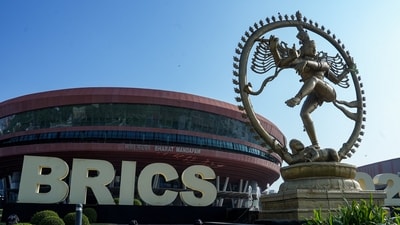 A view of Bharat Mandapam, the venue for the 18th BRICS Summit, featuring a Nataraja statue and a 'BRICS 2026' installation. (PTI) A view of Bharat Mandapam, the venue for the 18th BRICS Summit, featuring a Nataraja statue and a 'BRICS 2026' installation. (PTI)