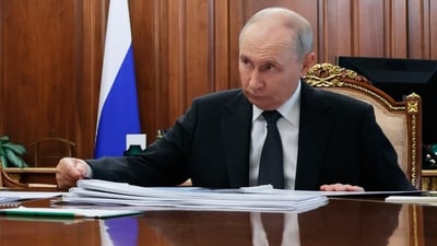 Russian President Vladimir Putin listens to Novgorod Region Governor Alexander Dronov at the Kremlin in Moscow, Monday, Sept. 14, 2026. (Vyacheslav Prokofyev/Sputnik, Kremlin Pool Photo via AP) (Vyacheslav Prokofyev/Pool Sputni)