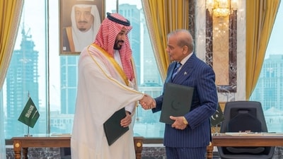 Saudi Crown Prince Mohammed bin Salman shakes hands with Pakistan's Prime Minister Shehbaz Sharif after signing a joint defence agreement in Mecca, Saudi Arabia, August 7, 2026. (via REUTERS)