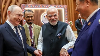 IFS Sidharth Babu seen beside Prime Minister Narendra Modi as he shakes hands with Russia's President Vladimir Putin and China's President Xi Jinping during the 18th BRICS Summit in New Delhi. (AFP) IFS Sidharth Babu seen beside Prime Minister Narendra Modi as he shakes hands with Russia's President Vladimir Putin and China's President Xi Jinping during the 18th BRICS Summit in New Delhi. (AFP)