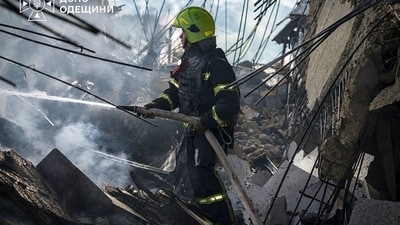 This handout picture taken and released by Ukrainian State Emergency Service on September 12, 2026 shows a firefighter working to put out fire in multi-storey residential building following a strike in the Ukrainian city of Odesa, amid the Russian invasion in Ukraine. Russian missile and drone strikes hit residential buildings overnight in Odesa, destroying entire floors and leaving 35 people injured, regional governor Oleg Kiper said. (AFP) This handout picture taken and released by Ukrainian State Emergency Service on September 12, 2026 shows a firefighter working to put out fire in multi-storey residential building following a strike in the Ukrainian city of Odesa, amid the Russian invasion in Ukraine. Russian missile and drone strikes hit residential buildings overnight in Odesa, destroying entire floors and leaving 35 people injured, regional governor Oleg Kiper said. (AFP)