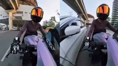 The incident came to light after a video taken from a camera mounted on the two-wheeler being driven by the woman rider went viral. (Video Screengrabs) The incident came to light after a video taken from a camera mounted on the two-wheeler being driven by the woman rider went viral. (Video Screengrabs)