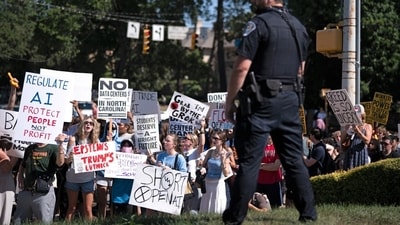 Demonstrators protested AI policy at a G-20 ministerial meeting on technology this month in Chapel Hill, N.C. Demonstrators protested AI policy at a G-20 ministerial meeting on technology this month in Chapel Hill, N.C.