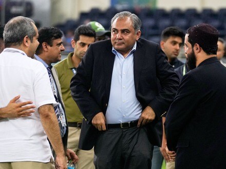 Mohsin Naqvi stands with officials on the field after India won the Asia Cup cricket final against Pakistan.