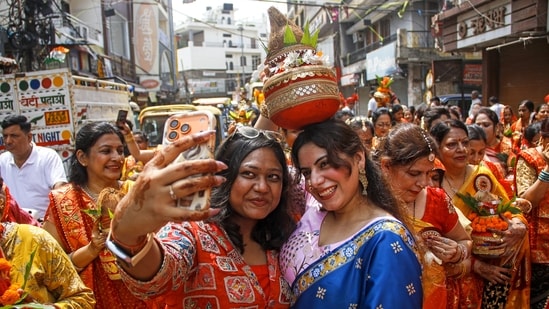 Gram it: Delhiites click selfies during the 151-women-led Kalash Shobha Yatra, organised by Ganesh Seva Samiti on Ganesh Chaturthi, in Delhi. On Monday, cultural activities kicked off as part of Ganesh Mahotsav across NCR. Details of the the happening in Faridabad are below.