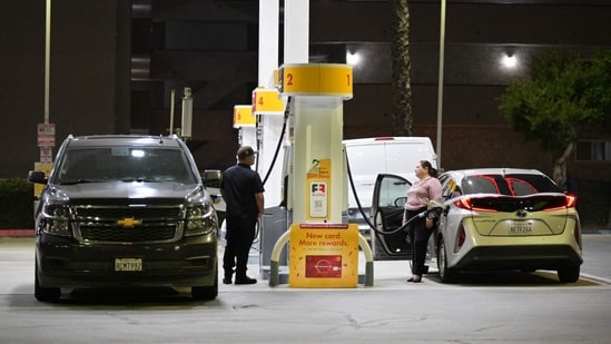 Drivers fill their vehicles with gasoline in Los Angeles, California.