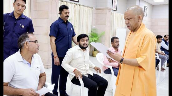 Uttar Pradesh CM Yogi Adityanath listening to people’s issues at Janata Darshan in Lucknow on September 14. (Sourced)